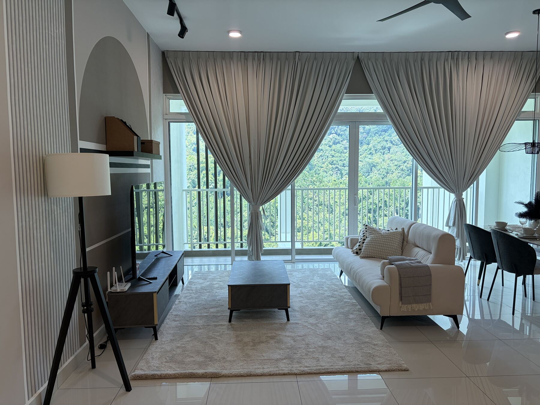 A Grand Maison three-bedroom residence at Batu Ferringhi, looking out across the rainforest hillside