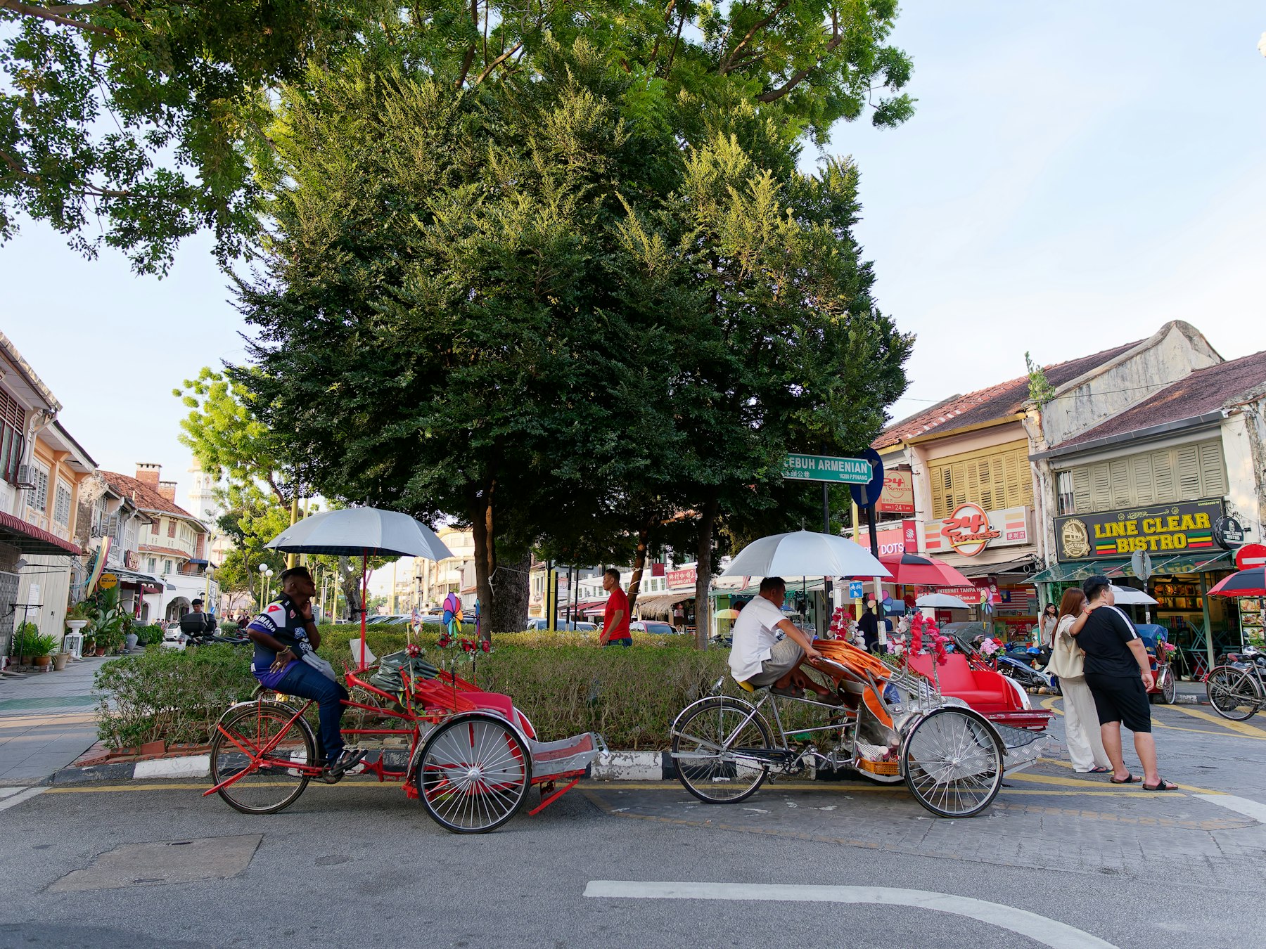 Trishaws on a heritage street in George Town, Penang
